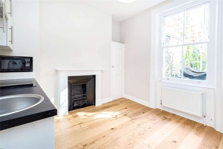 A ground floor studio apartment conveniently located for Marylebone High Street. - Photo 4