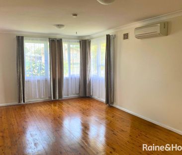 Comfortable Family Living in a Convenient Location - Photo 1