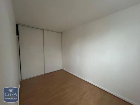 Appartement à louer 4 pièces 64.4m² - Photo 3