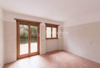 Apartment with garden and communal swimming pool