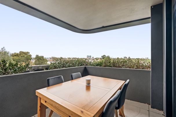 Stylish City Living with Resort-Style Amenities - Photo 1