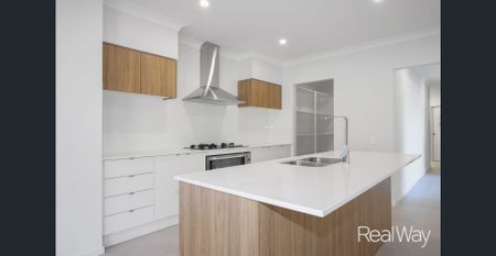 Modern 4-Bedroom Home in Tranquil Spring Mountain Neighborhood - Photo 3