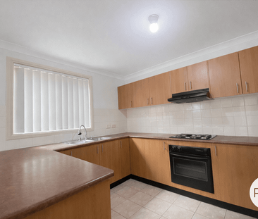 Spacious 3 Bedroom Townhouse - Perfect for Comfortable Living - Photo 4