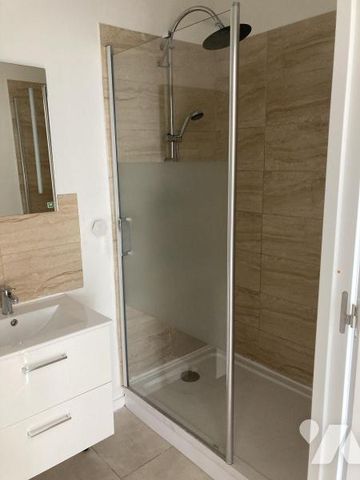 T2 en RDC avec jardin et garage - Photo 4