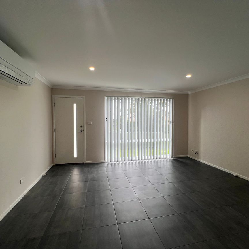 Modern Coastal Living with Ocean Glimpses - Photo 1