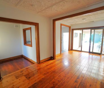 Character filled freestanding home with parking - Photo 1