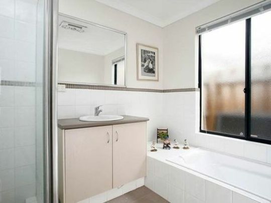 Spacious 4 x 3 Family Home with Dual Masters - Photo 1