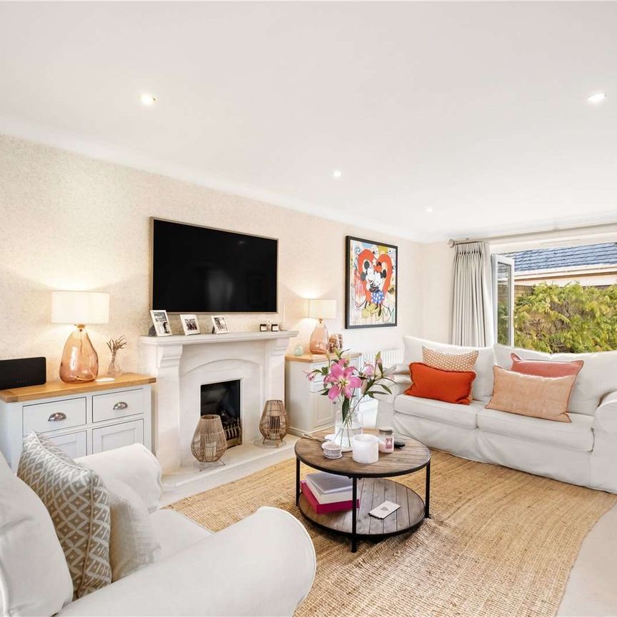 A wonderful four bedroom detached house with double garage and off street parking. - Photo 1