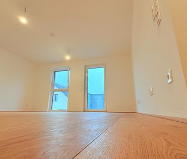 Balkonwohnung mit höchstem Wohnkomfort und modernster Küche auf 1,5... - Foto 2