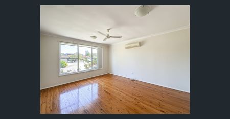 Charming Brick Home with Elegant Interiors and Low Maintenance Courtyard - Photo 2