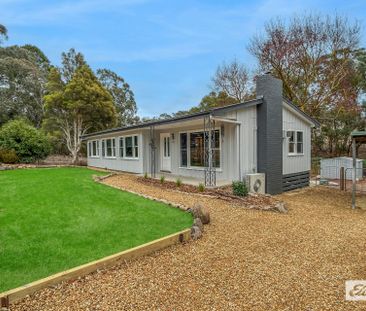 A beautifully renovated four-bedroom home - Photo 6