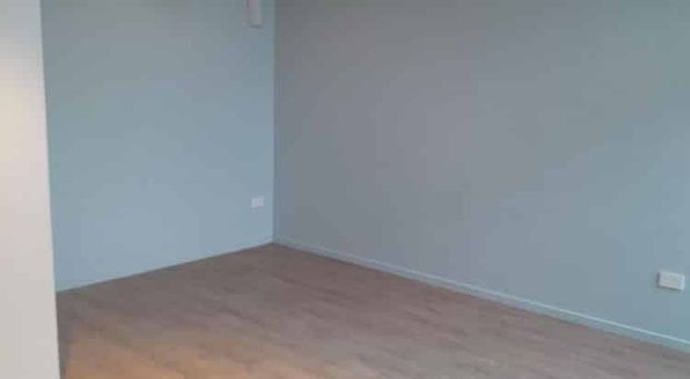 Charming 2BR Townhouse in Highland Park - Photo 1