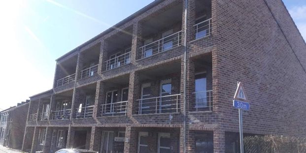 Appartement te huur in Ghlin voor € 595 met 1 slaapkamer - Photo 1