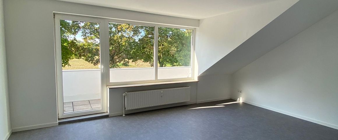 Geräumige Dachgeschosswohnung mit Blick ins Grüne in Dortmund - Photo 1