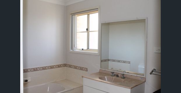 TOWNHOUSE WITH PERKS - Photo 1