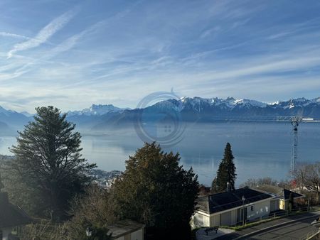 MAGNIFIQUE APPARTEMENT DE 3,5 PIÈCES AVEC VUE SUR LE LAC - Photo 3