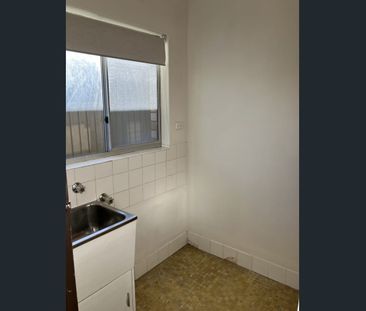 Two bedroom unit with secure garage and air conditioning - Photo 5