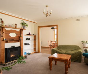 Feel at home, Living Here! - Photo 1