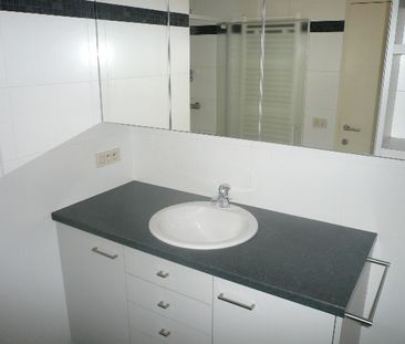 Een centraal gelegen appartement met 3 slaapkamers en terras - Photo 3