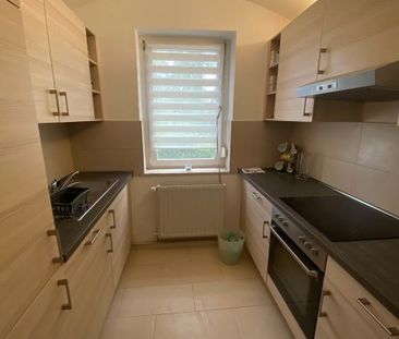 Schicke 3-Raum-Wohnung mit Einbauküche - Foto 1