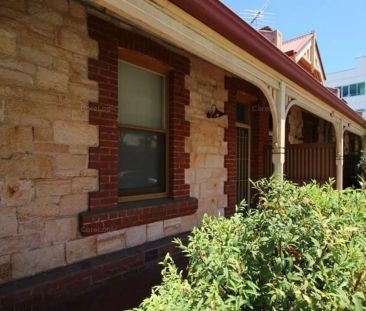 UNFURNISHED SPACIOUS 1 BR COTTAGE WITH SECURE REAR CARPARK - Photo 1