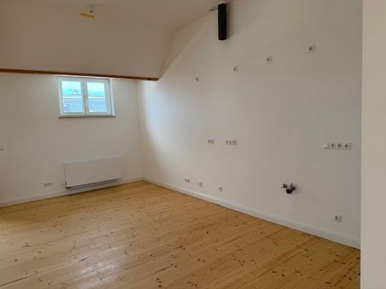 Großzügige 2-Zimmer-Dachgeschosswohnung in MG-Zentrum - Photo 1