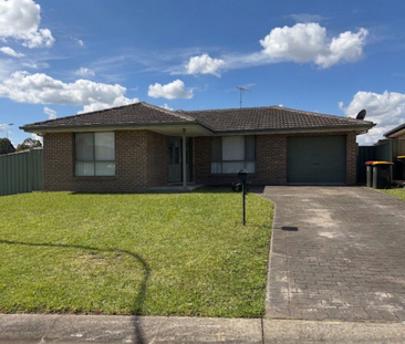 Spacious Family Home in a Prime Glenmore Park Location - Photo 4