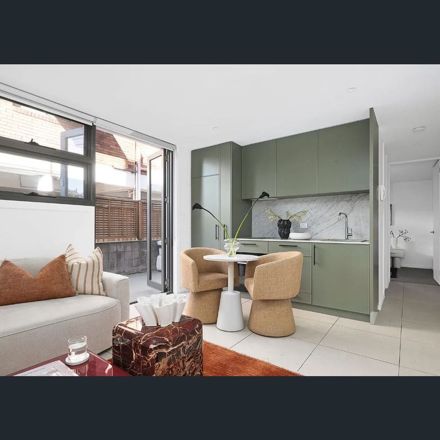 Private Courtyard Living in a Convenient Kensington Location - Photo 1