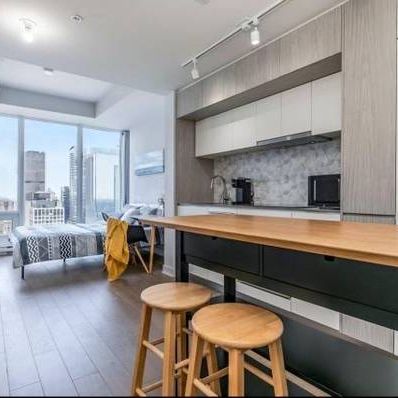 Montreal Furnished Condo Rental – Studio, City Views, Air Conditioning - Photo 1