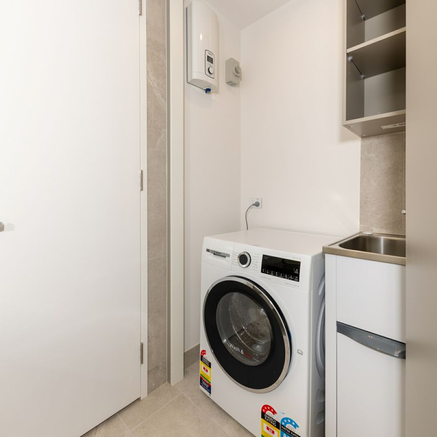 Spacious Urban Living in Prime Location - Photo 1