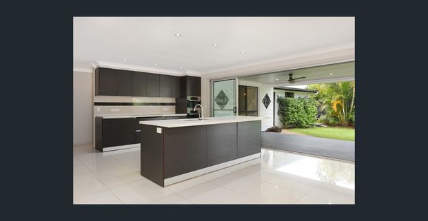 Renovated 4-Bedroom Home with Studio & Side Access - Photo 1