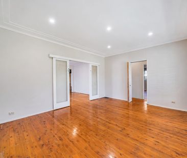 Spacious Family Home with Inground Pool & Flexible Living - Photo 1