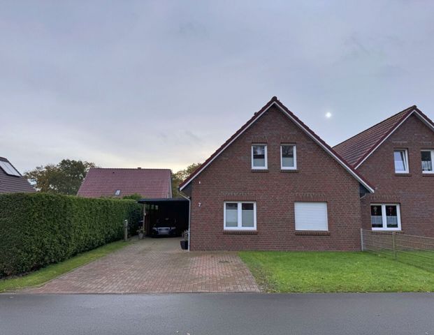 Ihr neues Zuhause: Großzügige Doppelhaushälfte mit Garten und Carport in Großefehn-Akelsbarg - Foto 1