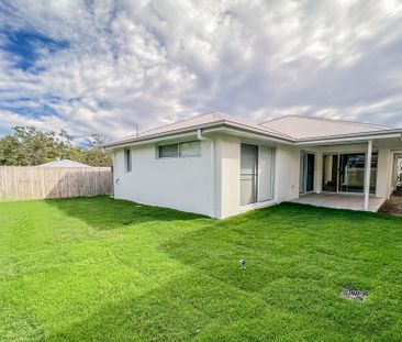 Spacious & Modern Family Home in Popular Location - Photo 5