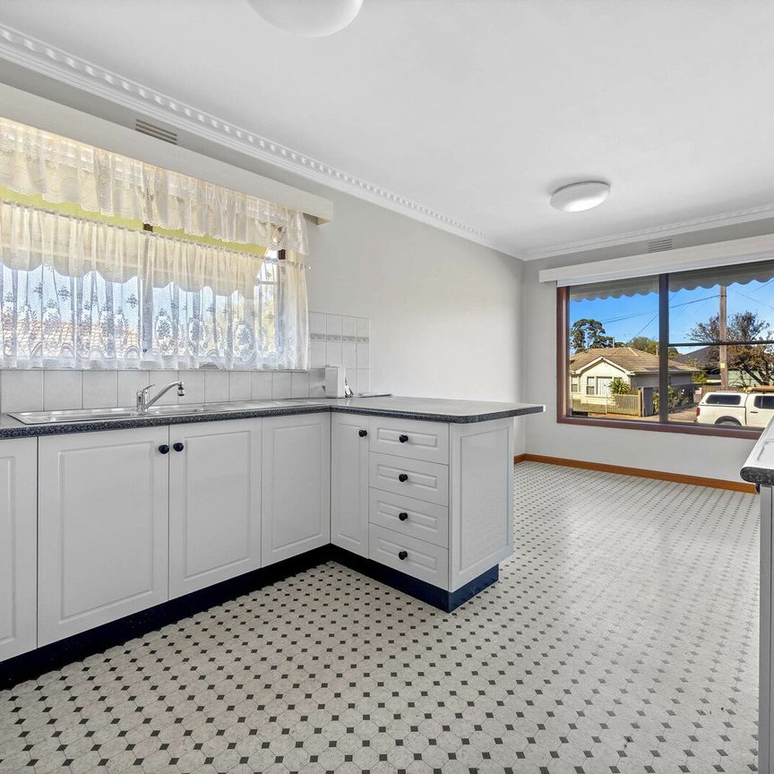 Solid Brick Home with Spacious Garage - Photo 1
