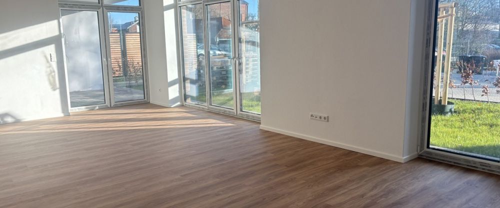Wohnen am Norder Tief: Schöne Erdgeschosswohnung mit Blick auf die Mühle - Foto 1