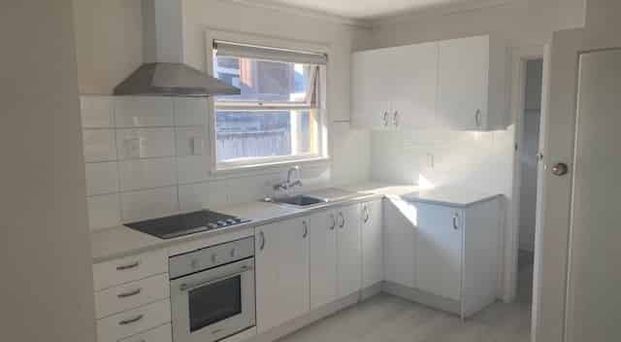 Three Bedroom Home in a Handy Location - Photo 1