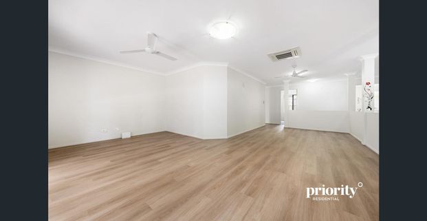 Low maintenance lifestyle in a highly sought-after location - Photo 1