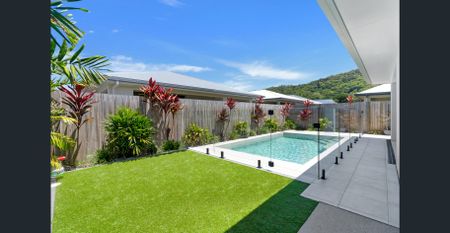 Near New | Modern Family Home with Pool | Bluewater Village living - Photo 5