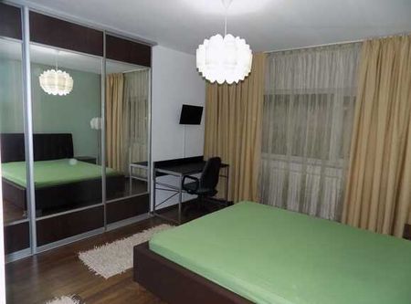 Apartament 3 camere, 70 mp, parcare, mobilat modern, imobil nou, zona strazii Mircea Eliade - Photo 2