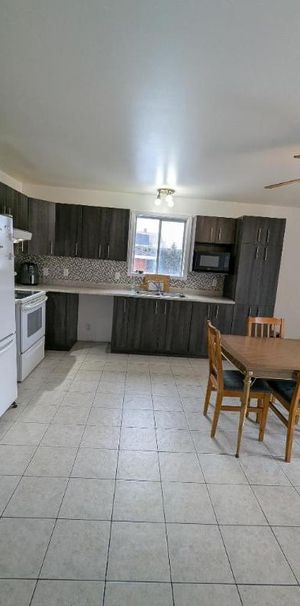 5 1/2 - Longueuil (Saint-Hubert) - 1 950 $/mois - Photo 1