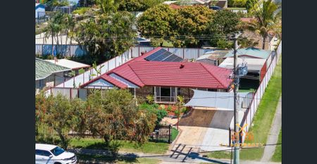 Spacious Brick & Tile Family Home with Huge Powered Shed & Remote Gate! - Photo 3