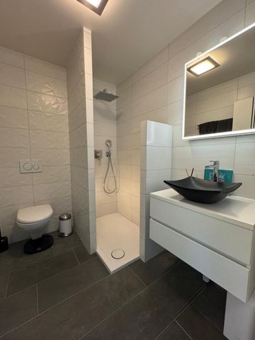 Beautiful 4.5-room duplex in Genolier - Photo 2