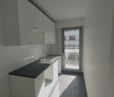 Appartement Paris 2 pièce(s) 56 m2 - Photo 2