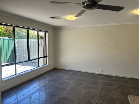 Modern Low Maintenance 3 Bedroom Home – Perfect for the Family! - Photo 2
