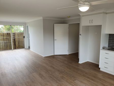 Ow-Maintenance, Disability-Friendly Unit with Flexible Dual-Living Layout in Newtown - Photo 4
