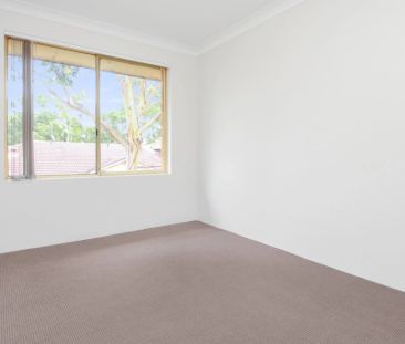 Top-Floor Unit – Your Peaceful Escape Awaits! - Photo 1