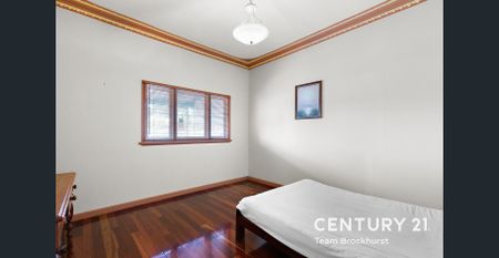 Charming 1950s Home with Modern Flexibility & Pristine Gardens! - Photo 5