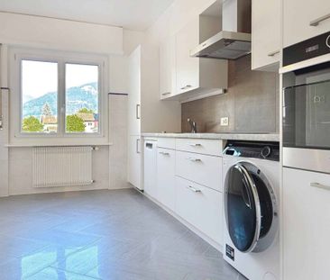 Appartement de 4,5 pièces au rez-de-chaussée - Photo 4