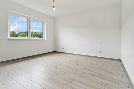 Moderne und großzügige Wohnung mit Einbauküche und Süd-Balkon - Foto 4